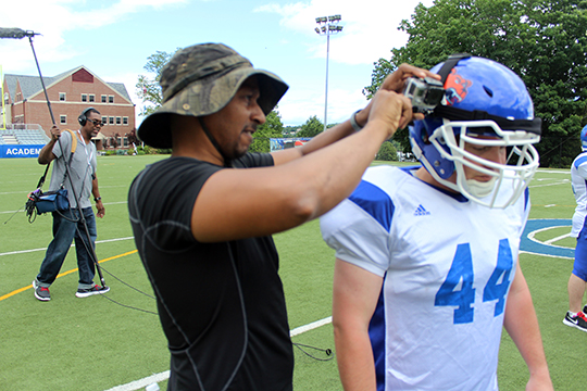 Tim Wilson setting up helmet camera